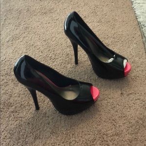 Black heels with hot pink peep toe